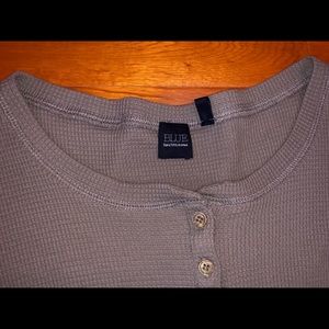 A grey long sleeve shirt